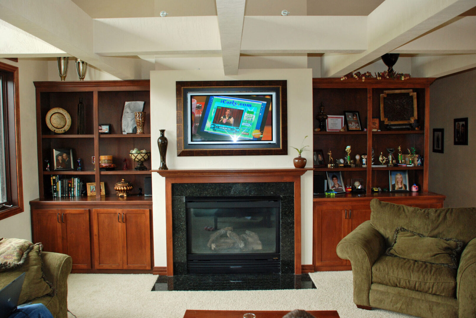 Television above a fireplace