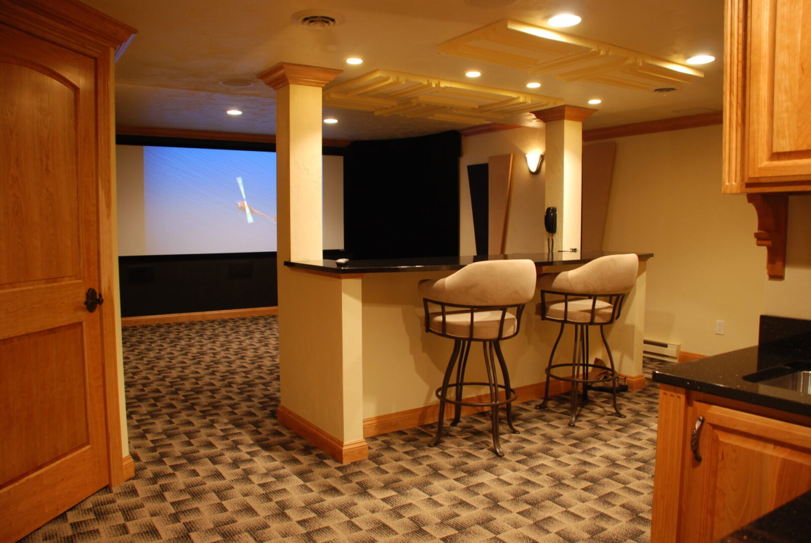 View of a home theater from its kitchen area